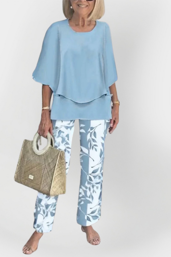 Set elegant cu bluză și pantaloni confortabili