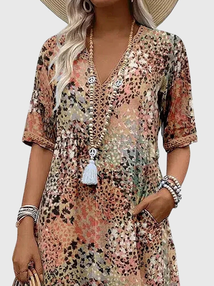 Bella | Rochie midi elegantă cu flori