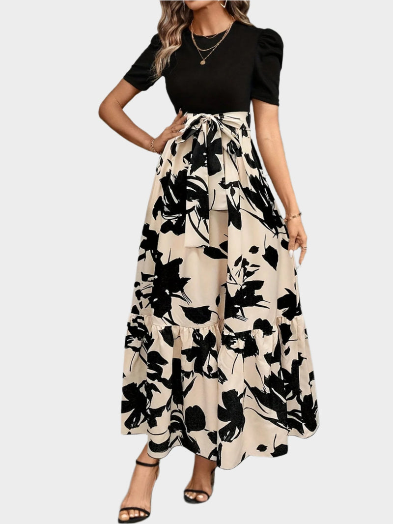 Rochie florală cu talie înaltă și modele în dungi