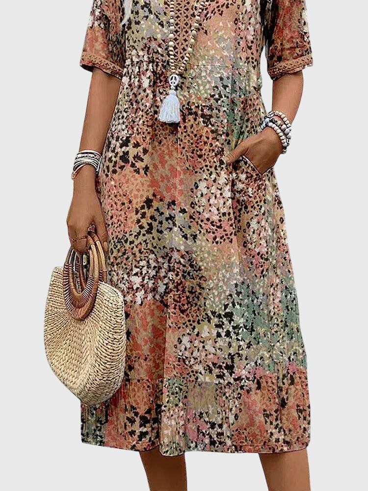 Bella | Rochie midi elegantă cu flori