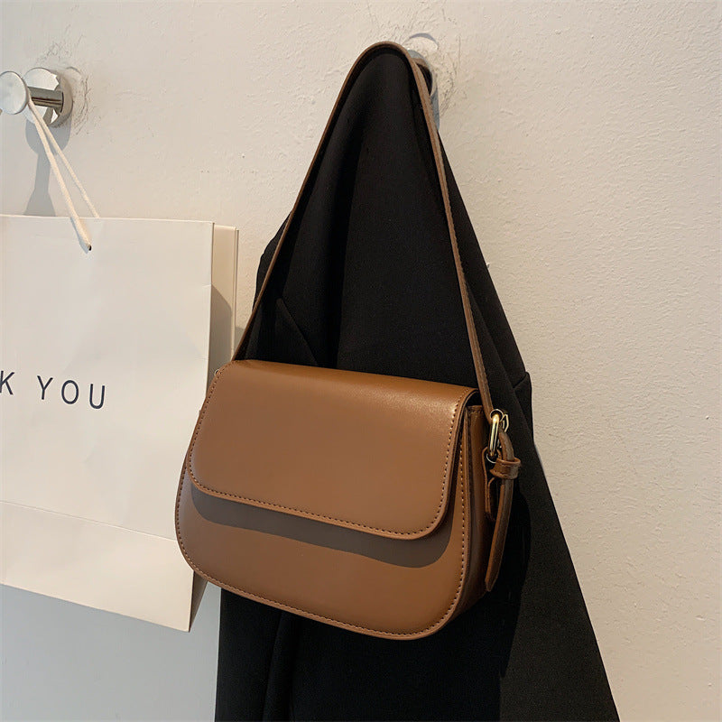 Geantă crossbody Avery™ Classic Saddle