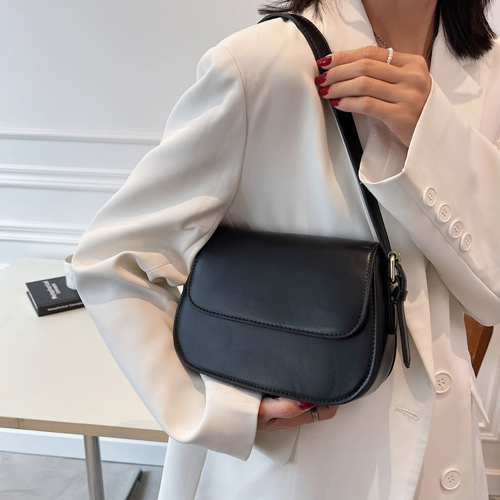 Geantă crossbody Avery™ Classic Saddle