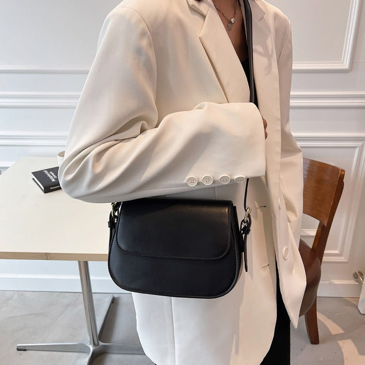 Geantă crossbody Avery™ Classic Saddle