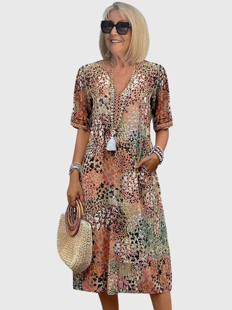 Bella | Rochie midi elegantă cu flori