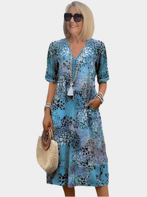 Rochie midi vibrantă cu buzunare